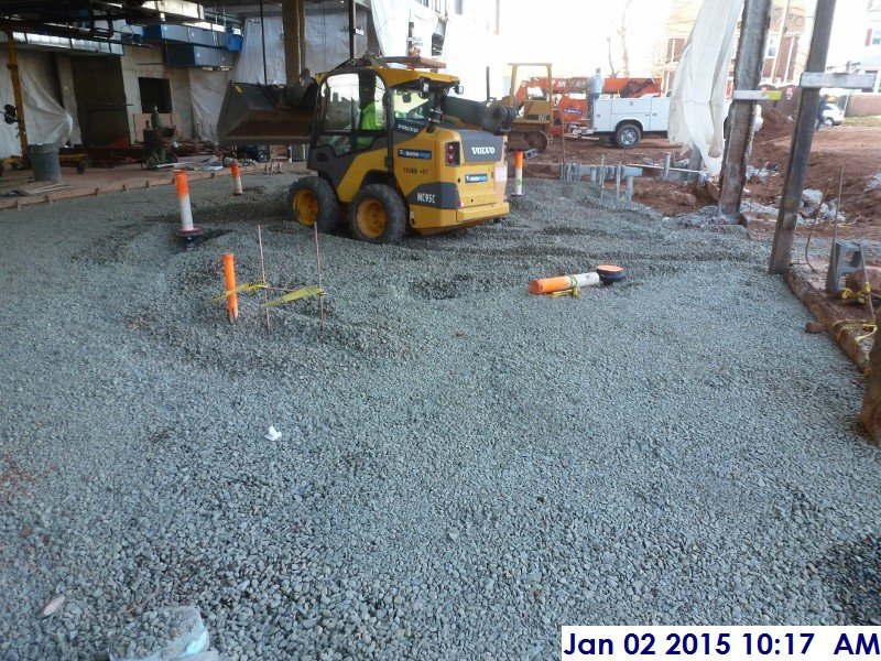Continued installing gravel at the 1st Floor Boiler-Electrical Room Facing West